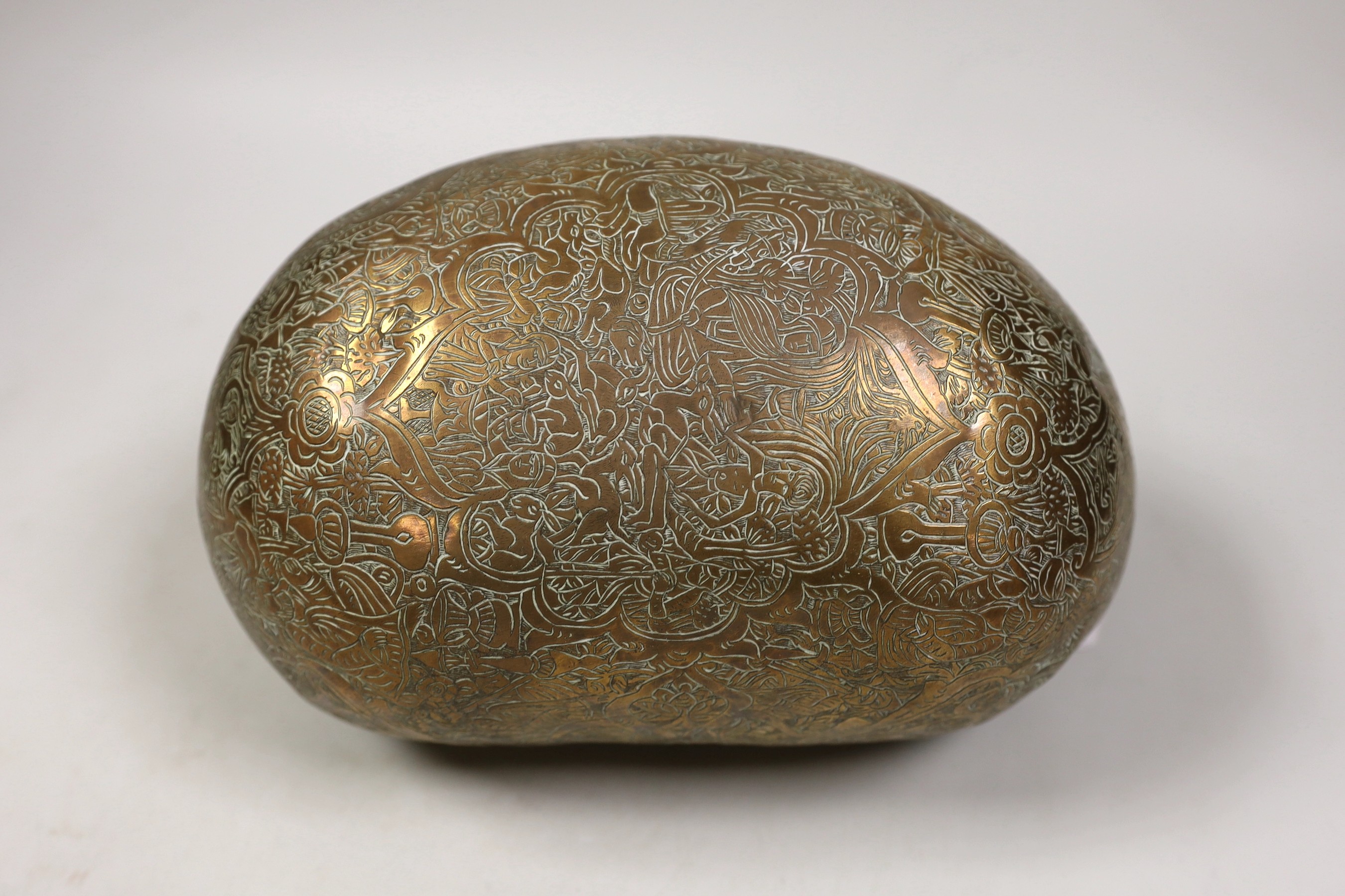 A 19th century Persian engraved brass kashkul, Qajar dynasty, 16cm wide and a bronze kettle, 17cm tall